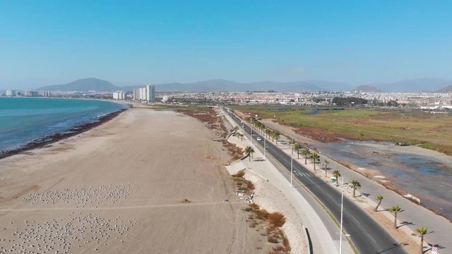 Beach, Road, pacific ocean, coast (Coquimbo, Chile) aerial view, drone footage