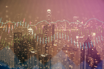 Double exposure of forex chart drawings over cityscape background. Concept of success.