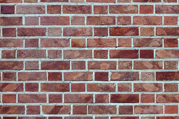 Red brown brick wall background.