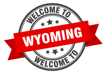 Wyoming stamp. welcome to Wyoming red sign