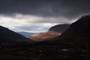 The summit of Tom na Gruagaich, Beinn Alligin, on a cloudy winters day near Torridon in the Scottish Highlands, UK.