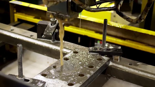 Electrical discharge machine EDM cutting for manufacturing process in the factory.