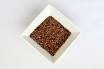 White plate with flax seeds