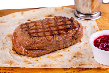 Beef steak, roasted on coal, served in lavash