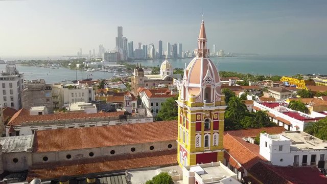 Old Town of Cartagena, Colombia - Drone shot orbiting around the Cathedral of Santa Catalina de Alejandr&iacute;a in the beautiful old city of Cartagena de Indias revealing the skyline of Bocagrande.