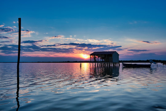 Houses made of wood poles on the sea water in Yumurtalik Lagoon, Adana City, Turkey