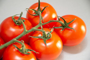 fresh tomatoes on black background