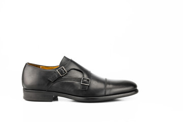 Black leather oxford isolated on white background.