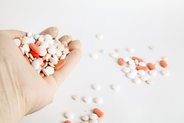 pills of different shapes and colors. large quantities of medicines