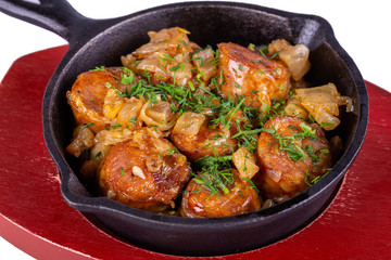 Home sausage with burning and green