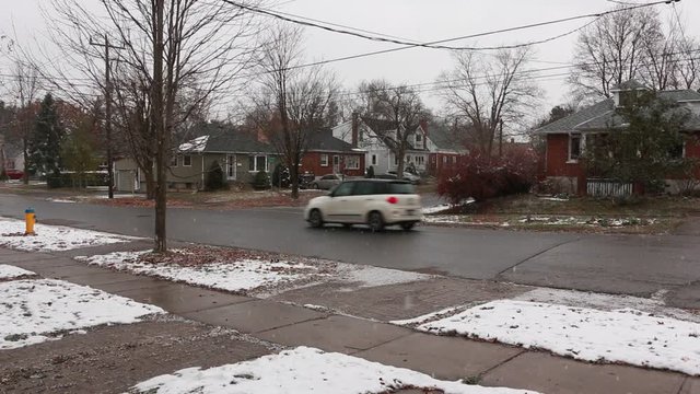 snow, winter, fall, car, mini, cold, cold days, house, tree, footpath, passing, transportation, peterborough, bethune, street, still video, no pan, snowfall, heavy, hd, ontario, canada, america, north
