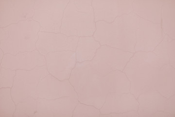 Texture of a white and pink wall in cracks, photo wallpaper, photophone, background. Flat lay. Copy space. The old wall.