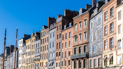 Honfleur, Normandy, typical houses with half-timbered facade in the harbor