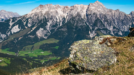 Fototapeta na wymiar Beautiful alpine view with details of a rock at Leogang, Salzburg, Austria