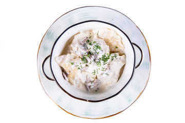 Vareniki with sour cream and mushrooms