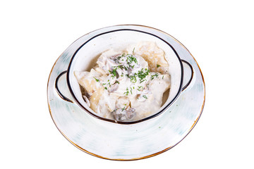 Vareniki with stewed mushrooms in sour cream