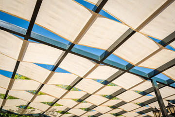 Textile roof shade structure. Outdoor canapies and shade structure