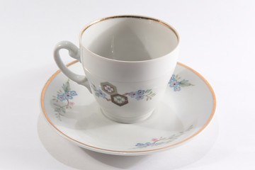 cup and saucer on a white background