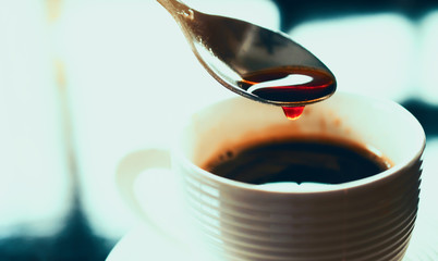 cup of coffee with sugar