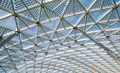 Abstract high-tech architecture background photo, internal structure of glass roof arch with...