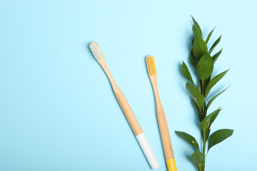 natural bamboo toothbrushes on an open background top view. Oral and dental care.