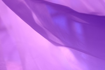 Lilac abstract background. Wrinkled fabric, haze, the moire patterns.
