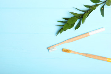 natural bamboo toothbrushes on an open background top view. Oral and dental care.