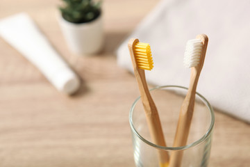 natural bamboo toothbrushes on the table. Oral and dental care.