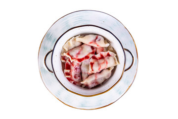 Vareniki with fresh cherries and syrup