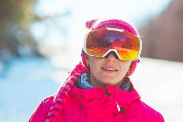 Beautiful snowboarder girl in googles