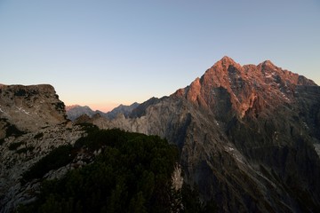 Fototapeta na wymiar sunrise on Mt. Watzmann and its famous east face, seen from Mt. Hirschwieskopf, Berchtesgaden national park, Bavaria, Germany