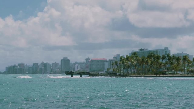 Beach coast whit large building in Puerto Rico