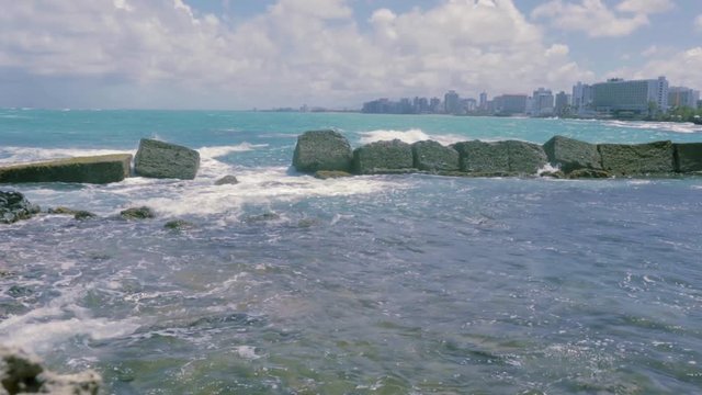 Sunny Escambron Beach, wave breaker