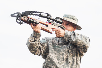 Fototapeta premium aiming and shooting with crossbow