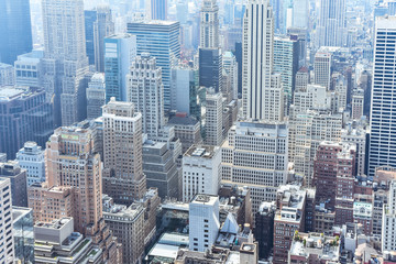 Aerial close up view of crowded buildings in New York City on a sunny day. Construction concept, crowded cities, and apartment rentals. NYC, USA