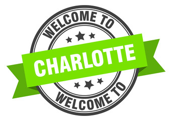 Charlotte stamp. welcome to Charlotte green sign