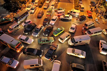 Messy traffic at crossroad at night, aerial view - obrazy, fototapety, plakaty