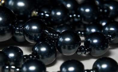 Jewelry, pearl beads photographed close-up, blurred background