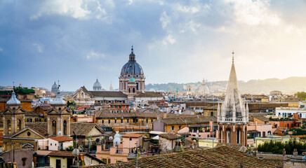 Fototapeta na wymiar Rooftops of Rome under dramatic sky