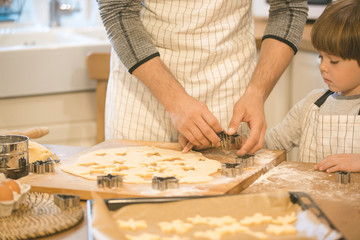 Dad and son make cookies