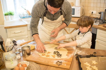 Dad and son make cookies