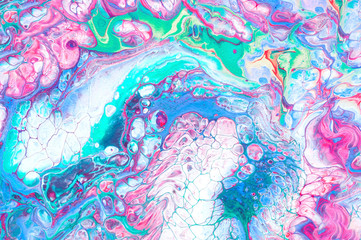 Colorful abstract background with mixed acrylic paints. Hand painted in the style of Fluid art. Trendy color 2020.
