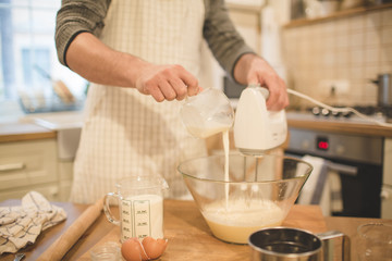 Young man bakes cookies