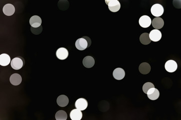 colorful glitter vintage lights background. defocused