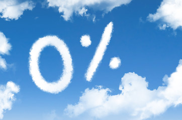 Clouds zero percent discount symbol in the blue sky.