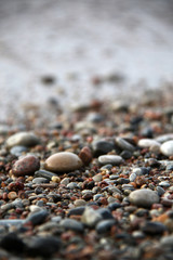 lot of pebbles on the beach close up