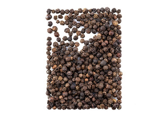 Black peppercorns isolated on white background with copy space for text or images. Spices and herbs. Packaging concept. Close-up.