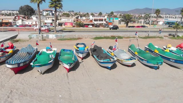 Colorful Boats on the shore beach, pacific ocean coast (Coquimbo, Chile)