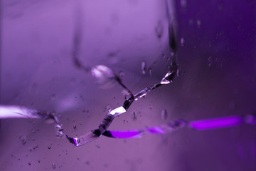 Cracked glass Surface in purple colour.