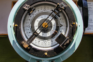 Naklejka premium A big old compass of a trading ship.